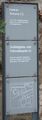 Informationsschild an Haus 1 und 2