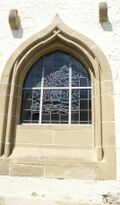 früherer Ausgang zum Friedhof und heutiges Fenster