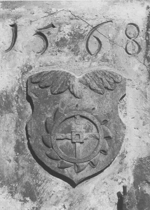 Datei:Frühere Wagmühle, Eckquader mit Wappenschild darauf Mühlrad und Zahl 1568, später am Fachwerkhaus Gerberstraße 41.jpg