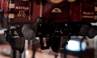 GHV Spielzeugeisenbahn-Rungenwagen-Märklin-Signet2.JPG